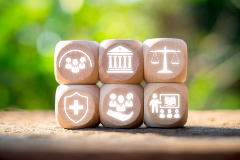 six wooden blocks each with a symbol
