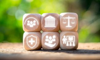 six wooden blocks each with a symbol